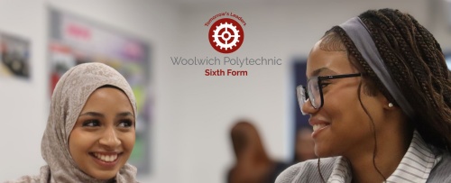 Two sixth form female students laughing and talking